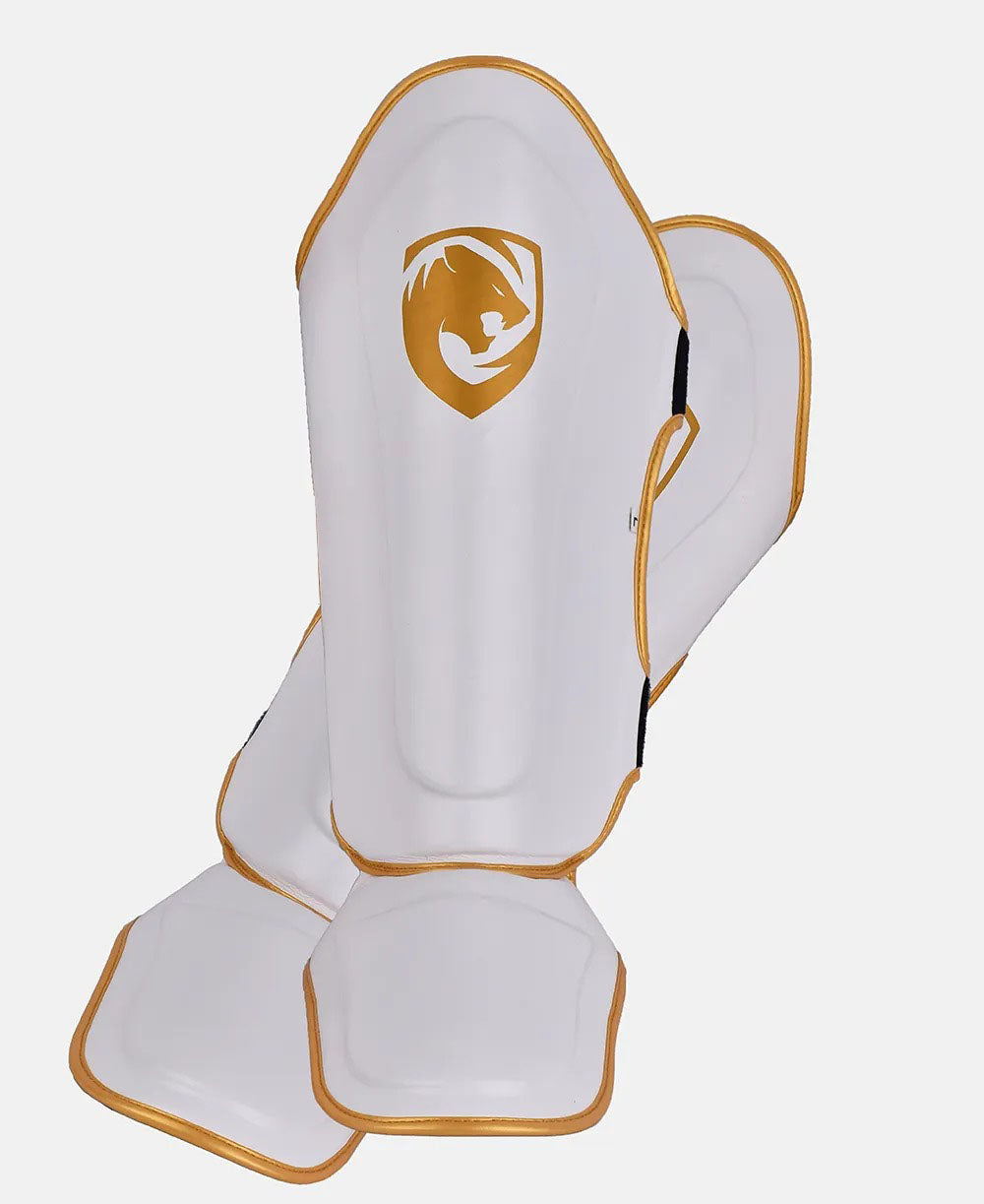 Combat Training Shin Guards with Dynamic Force Dispersion System